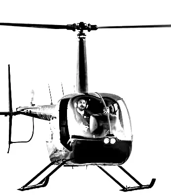 Student pilot flying a piston engine helicopter — helicopter training